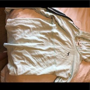 Mint green hoodie. Stripes on sleeves